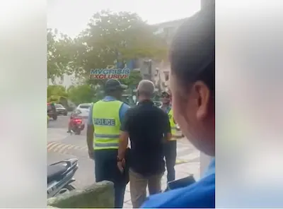 އެސްޖޭ މޯލްގެ އަންހެން މުވައްޒަފެއްގެ ގަޔަށް އަތްލަނިކޮށް ހިފެހެއްޓި ފިރިހެނަކު ފުލުހުންނާ ޒުވާބު ކޮށްފި
